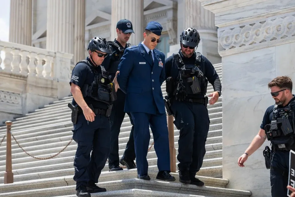 Air Force Major Jason Watson arrested at US Capitol during impeachment protest