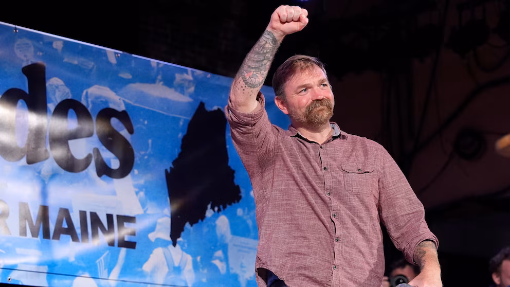 Senator Graham Platner celebrates winning the Maine Democratic Senate primary amid party divisions and controversies.